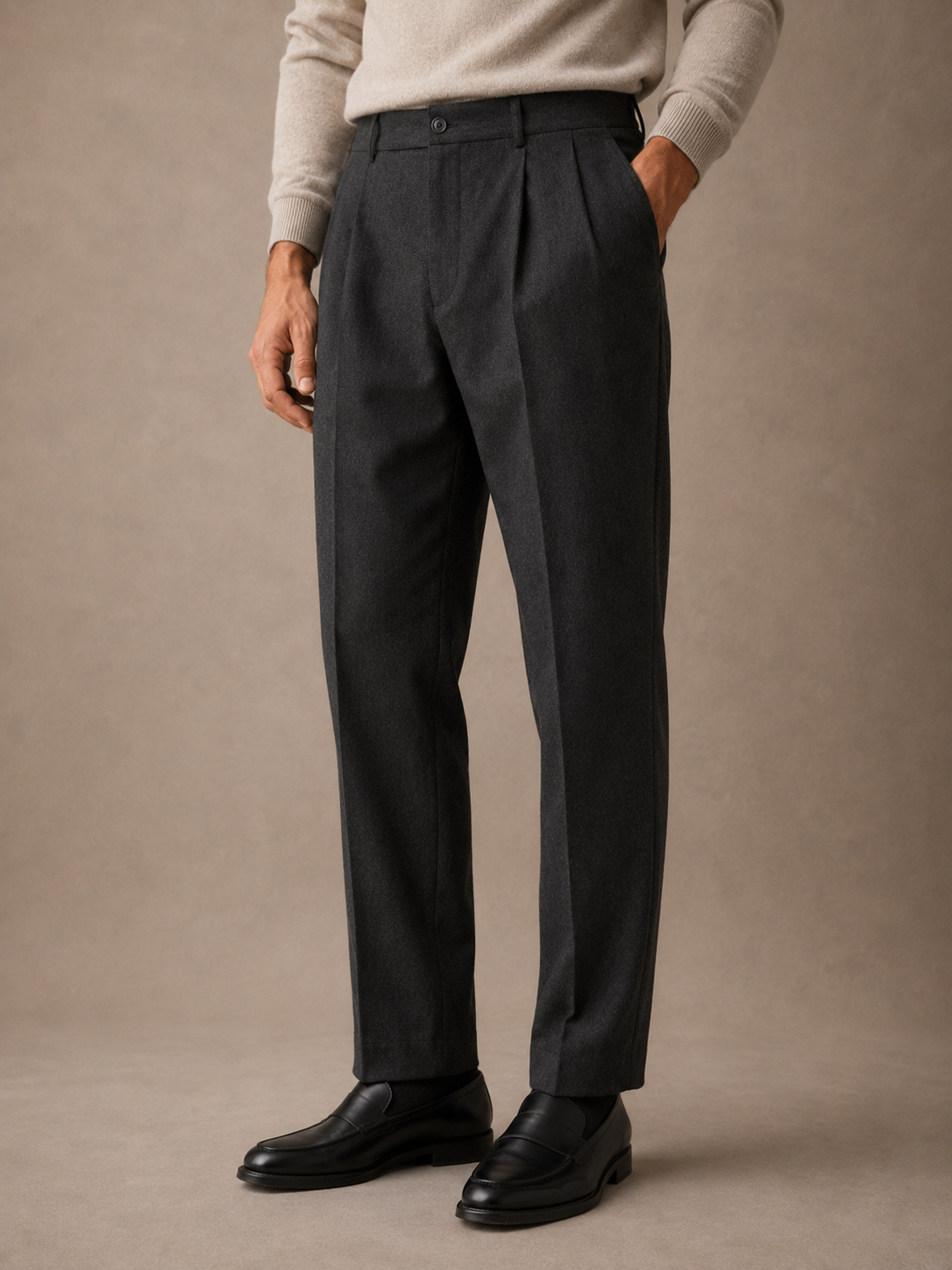 Men's pleated wool trouser in charcoal, worn